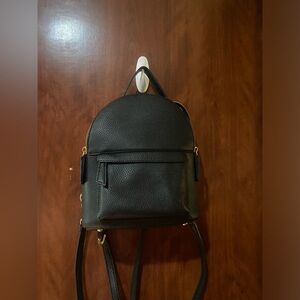Sleek Black Pebbled Mini Backpack with Gold Hardware